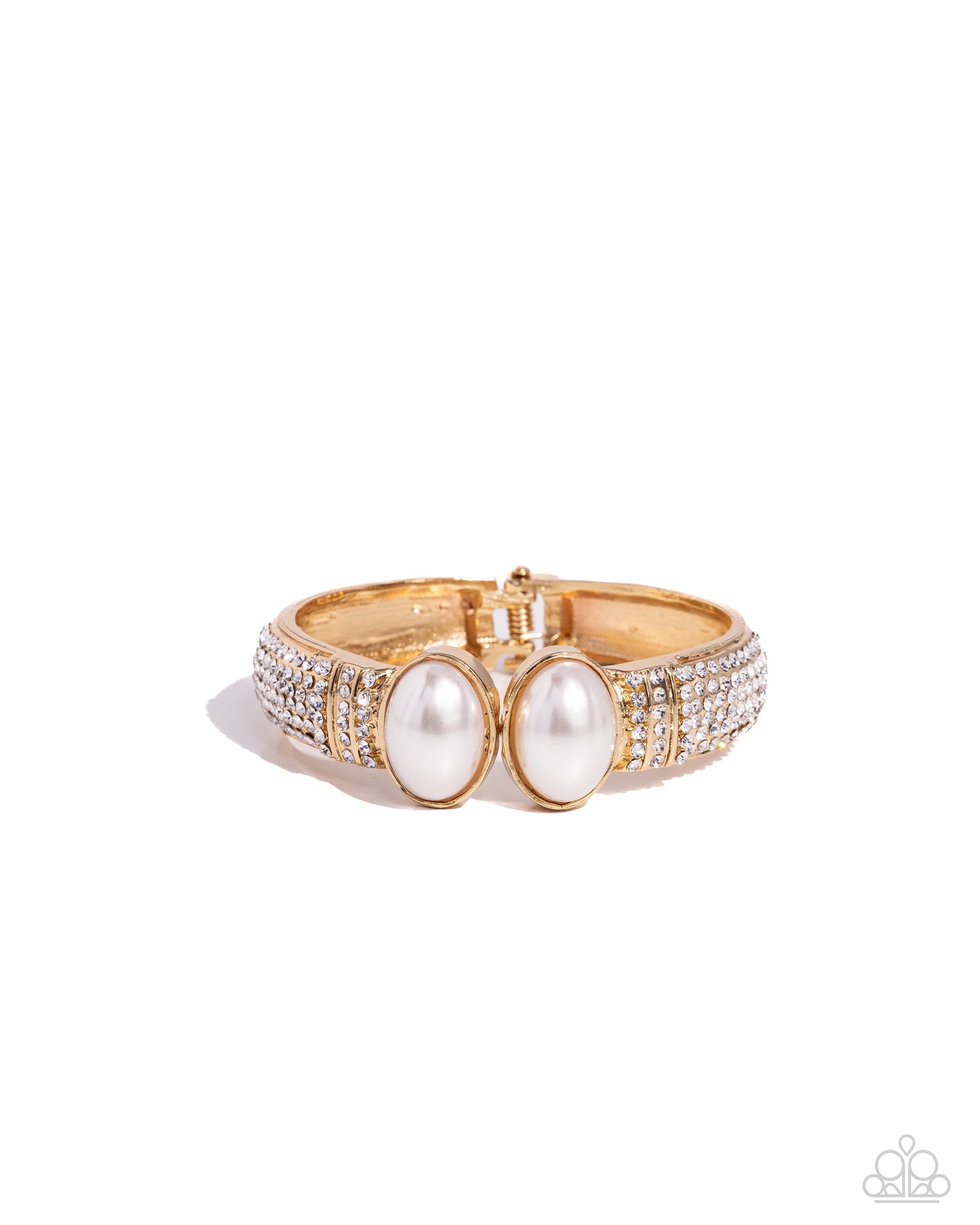Featuring oversized white pearls, two shiny gold bars embellished with row after row of white rhinestones attach to a spring-like fitting as they curl around the wrist for a refined finish. Features a hinged closure.  Sold as one individual bracelet.