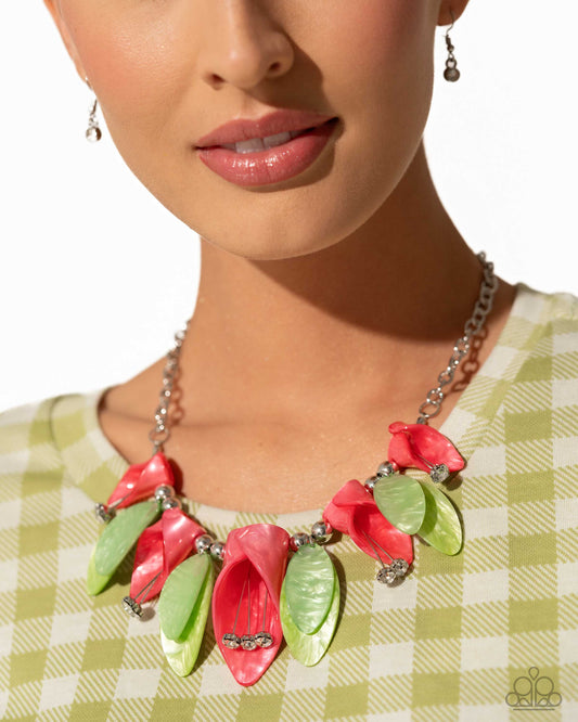 Bright coral acrylics, curl into tulip-like flowers while green acrylics, featuring a reflective shimmer, layer into leaves that alternate with the coral tulips. White gems bloom from dainty silver wires, forming into pistils from the coral tulips while glossy duos of silver beads frame the green leaves for additional sheen. Features an adjustable clasp closure.  Sold as one individual necklace. Includes one pair of matching earrings.