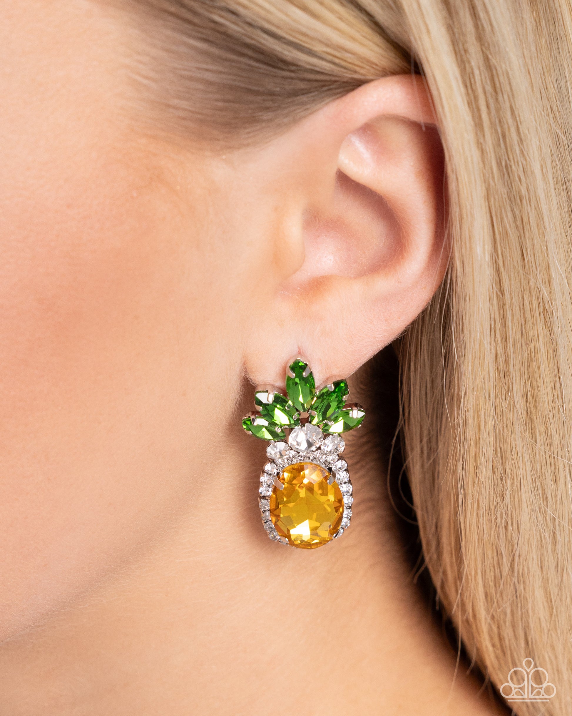 Featuring a pineapple motif, a collection of green marquise-cut faceted gems, white gems, dainty white rhinestones, and silver-pronged yellow oval gems creates a summery statement at the ear. Earring attaches to a standard post fitting.  Sold as one pair of post earrings.