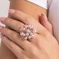 Paparazzi Accessories - Bubbly Beau - Pink Rings featuring a floral, fanned-out pattern, a collection of glossy baby pink pearls bloom and extend out on dainty silver rods from a pearly center atop the finger. Features a stretchy band for a flexible fit.  Sold as one individual ring.
