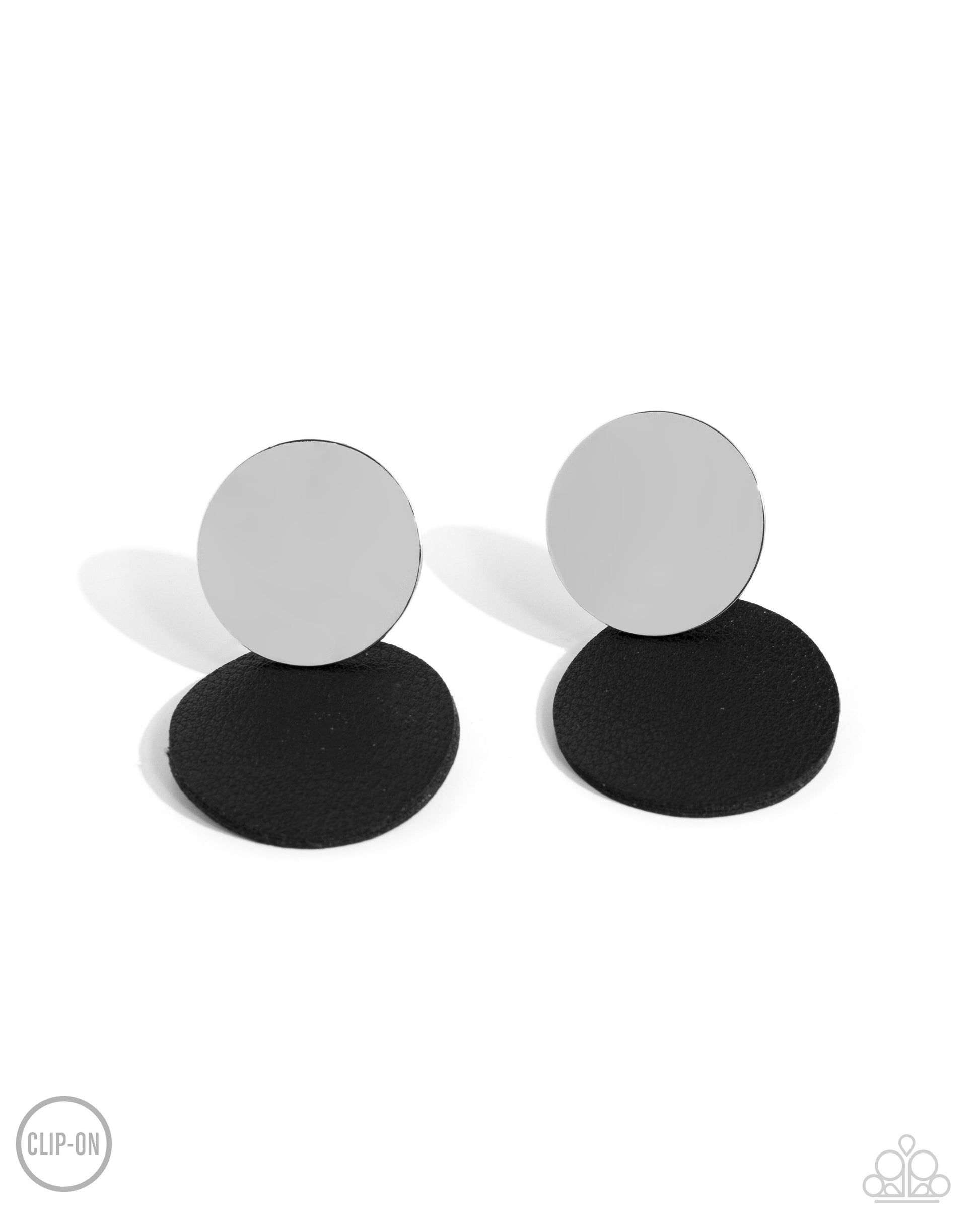 Paparazzi Accessories - Leather Leader - Black Clip-On Earrings an&nbsp;oversized silver disc gives way to an even larger disc of black leather for a badlands basic. Earring attaches to a standard clip-on fitting.  Sold as one pair of clip-on earrings.