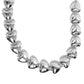 Infused along a classic silver chain, sleek silver hearts alternate with dainty silver beads along the neckline for a romantically refined statement. Features an adjustable clasp closure.  Sold as one individual necklace. Includes one pair of matching earrings.