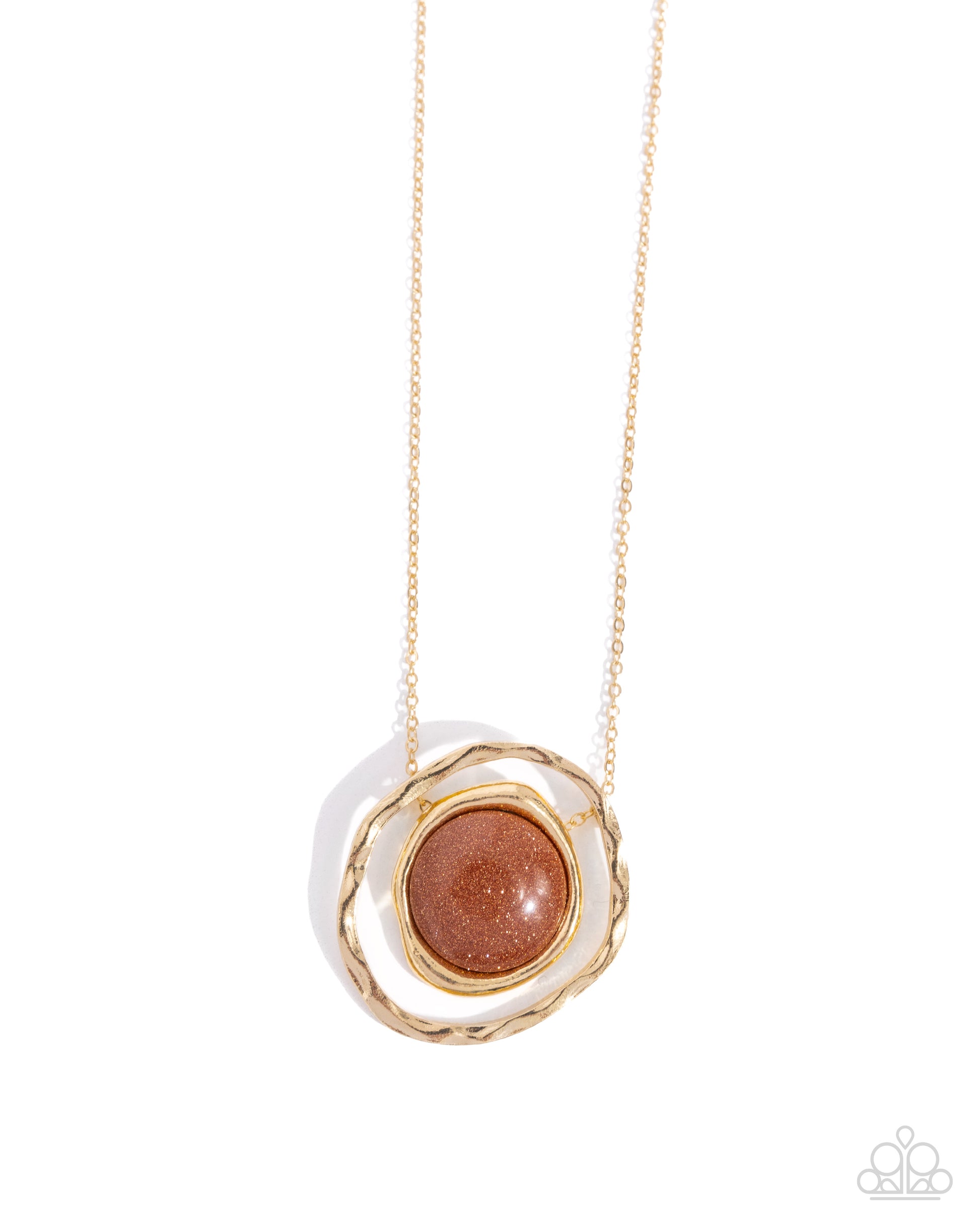 Suspended along the center of an oversized, warped, hammered gold hoop, a goldstone pendant, pressed in a smaller warped gold frame glides along a dainty gold chain for a glamorously gentle look. Features an adjustable clasp closure. As the stone elements in this piece are natural, some color variation is normal.  Sold as one individual necklace. Includes one pair of matching earrings.