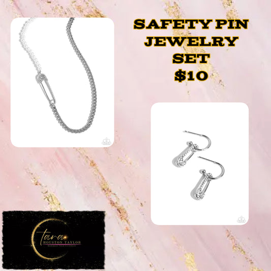 A strand of white pearls collides with a layer of chain to create an abstract blend of grit and glitz. The links of the curb chain offset the pearly sheen of the beads that lay on the opposite side, perfectly balancing the contrasting design. A white rhinestone-embellished oversized safety pin charm connects the two strands for a surprising hint of edge. Features an adjustable claspSold as one individual necklace. Includes one pair of matching earrings. Earring: "Safety Pin Sentiment - White"