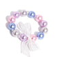 <p data-mce-fragment="1">Two glossy pearls one in blue and one in pink stack atop one another while an airy, chiffon white ribbon is tied in the center of the pearls for a refined finish. Earring attaches to a standard fishhook fitting.</p> <p data-mce-fragment="1"><i data-mce-fragment="1">Sold as one pair of earrings.</i></p>