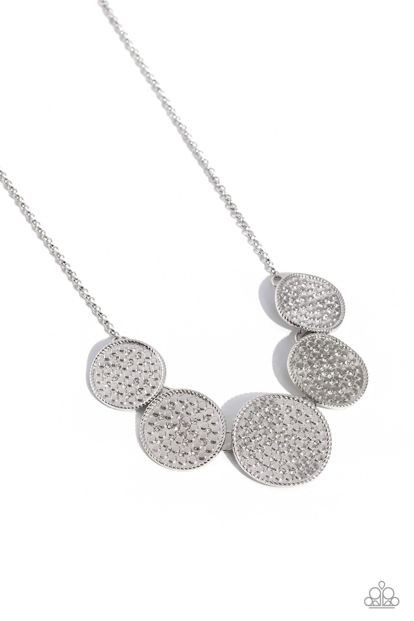 Paparazzi Accessories - Medaled Mosaic - White Necklaces embossed in a dotted, rhinestone encrusted motif, a refined collection of warped silver discs royally links below the collar for an artisan inspired fashion. Features an adjustable clasp closure.  Sold as one individual necklace. Includes one pair of matching earrings.