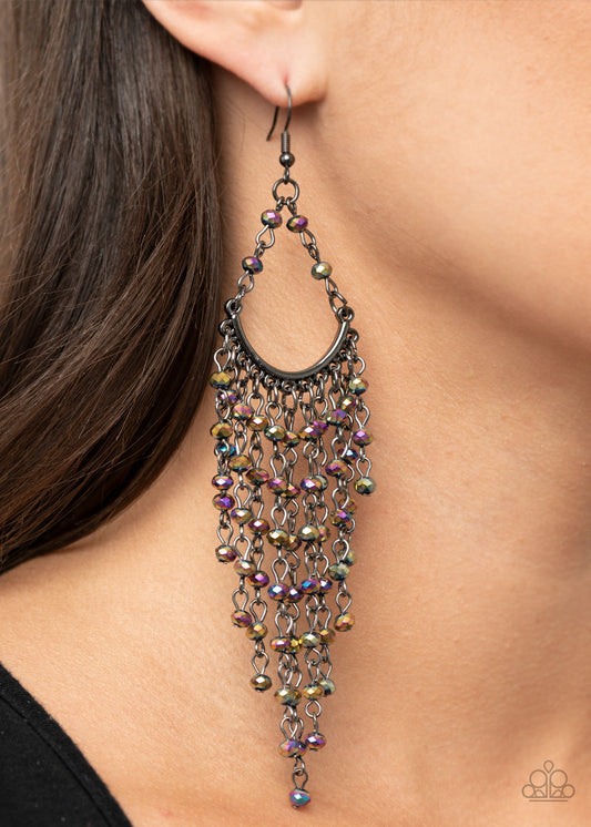 Paparazzi Accessories - Metro Confetti - Multi Earrings Oil spill rhinestone beaded tassels cascade from the bottom of a bowing gunmetal bar, creating an ethereal tapered fringe. Earring attaches to a standard fishhook fitting. Due to its prismatic palette, color may vary.  Sold as one pair of earrings.
