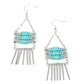 Rows of cylindrical silver and turquoise stone beads are threaded along metal rods between faceted silver cubes. Silver rods stream out from the bottom of the stacked display, resulting in an earthy fringe. Earring attaches to a standard fishhook fitting.  Sold as one pair of earrings.
