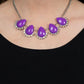 Underscored by rows of iridescent rhinestones, a row of oversized purple teardrop beads dramatically links into a powerful pop of color below the collar. Features an adjustable clasp closure. Due to its prismatic palette, color may vary.  Sold as one individual paparazzi necklace. Includes one pair of matching paparazzi earrings.