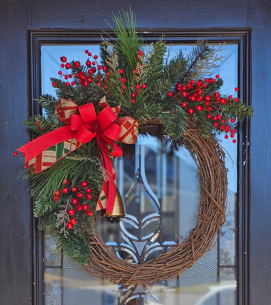 Grapevine greenery wreath with berries and argyle bow