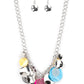 Paparazzi Accessories - Oceanic Opera - Multi Necklaces a summery collection of bent silver discs, multicolored shell-like discs, and silver mandala-like accents cascades from a pair of layered silver chains, resulting in a bubbly and boisterous fringe below the collar. Features an adjustable clasp closure.  Sold as one individual necklace. Includes one pair of matching earrings.