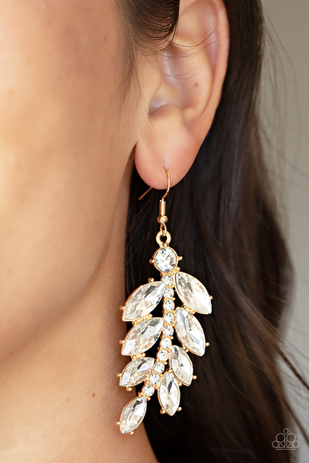 Ice Garden Gala - Gold Rhinestone Earrings versized marquise cut white rhinestones fan out from a curved gold bar encrusted in glassy white rhinestones, resulting into a glamorously leafy statement piece. Earring attaches to a standard fishhook fitting.  Sold as one pair of earrings.