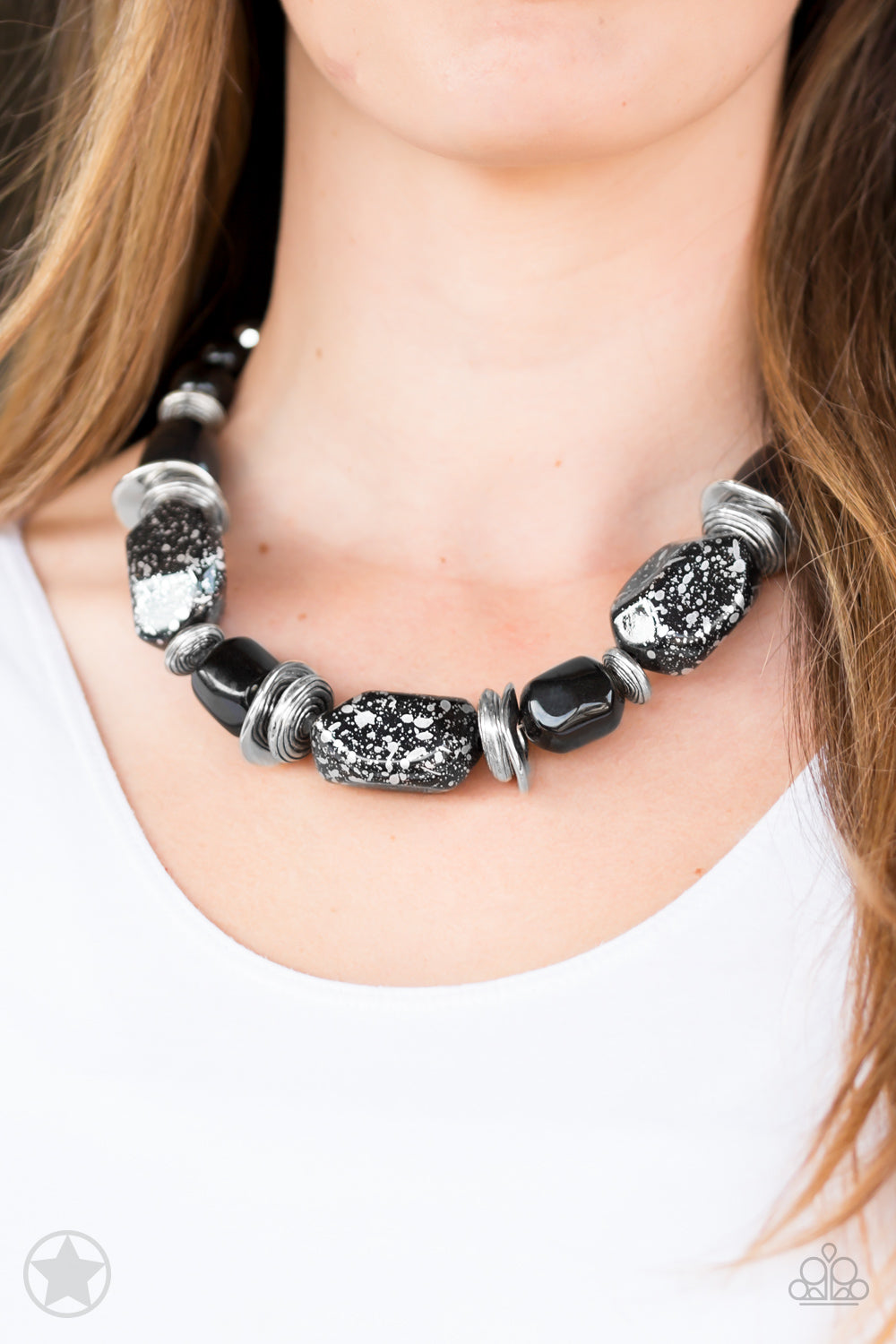 Chunky black beads with speckles of silver and a gorgeous glazed finish are threaded together with thick silver rings and smooth black beads. Features an adjustable clasp closure. Sold as one individual necklace. Includes one pair of matching earrings.  Get The Complete Look! Bracelet: "Glaze of Glory - Black" (sold separately)