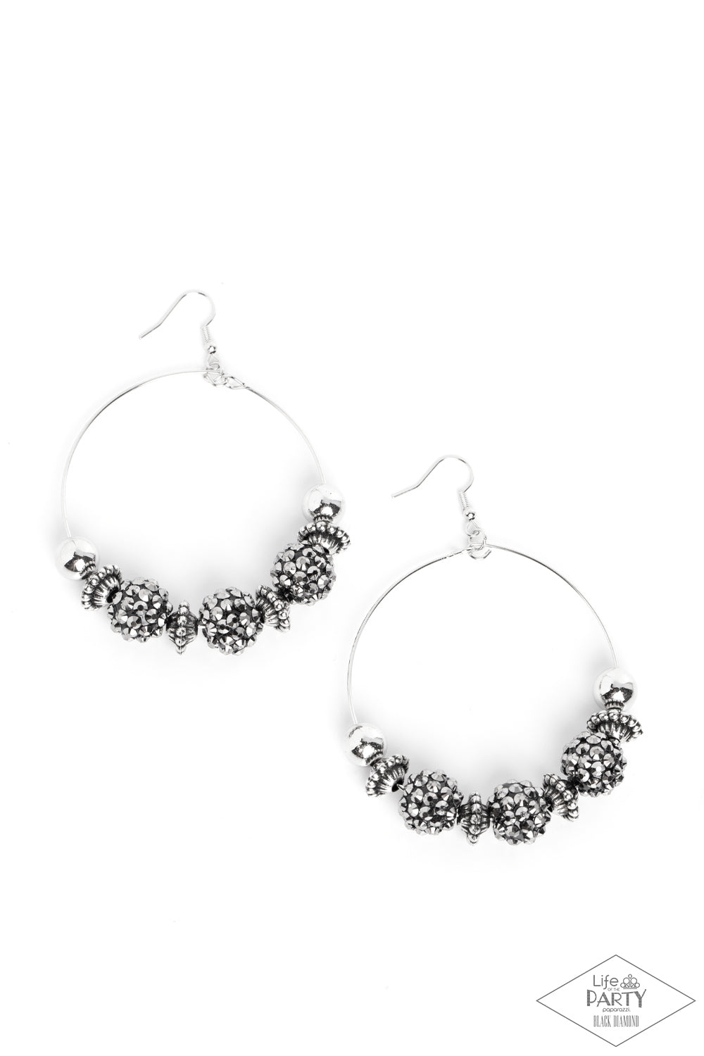 Paparazzi Accessories - I Can Take a Compliment - Silver Earrings a stunning array of studded silver accents, oversized silver beads, and hematite rhinestone encrusted black beads are threaded along a dainty silver wire hoop, resulting in a dazzling pop of color. Earring attaches to a standard fishhook fitting.  Sold as one pair of earrings.