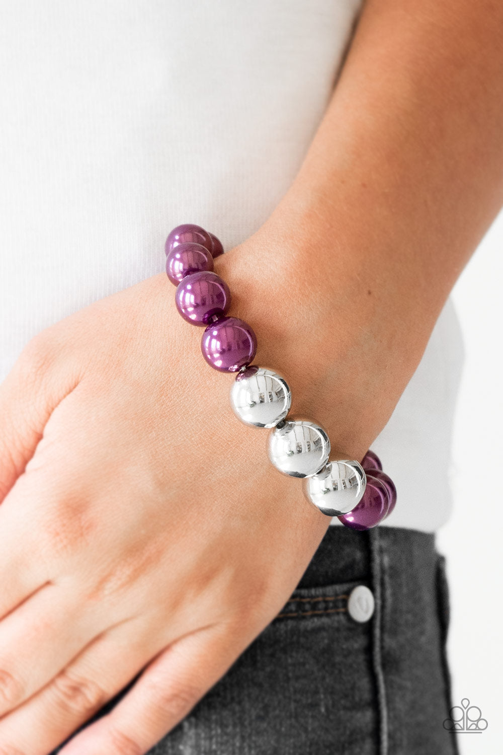 Paparazzi Accessories All Dressed UPTOWN - Purple Bracelets gradually increased in size near the center, oversized pearly purple and shiny silver beads are threaded along a stretchy band around the wrist for a glamorous finish.
