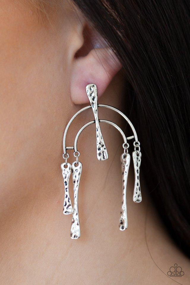 Paparazzi Accessories Artifacts Of Life - Silver Earrings hammered bars dangle from the ends of a bowing silver frame, creating an abstract lure. A matching silver bar adorns the center of the frame for a handcrafted finish. Earring attaches to a standard post fitting.  Sold as one pair of post earrings.