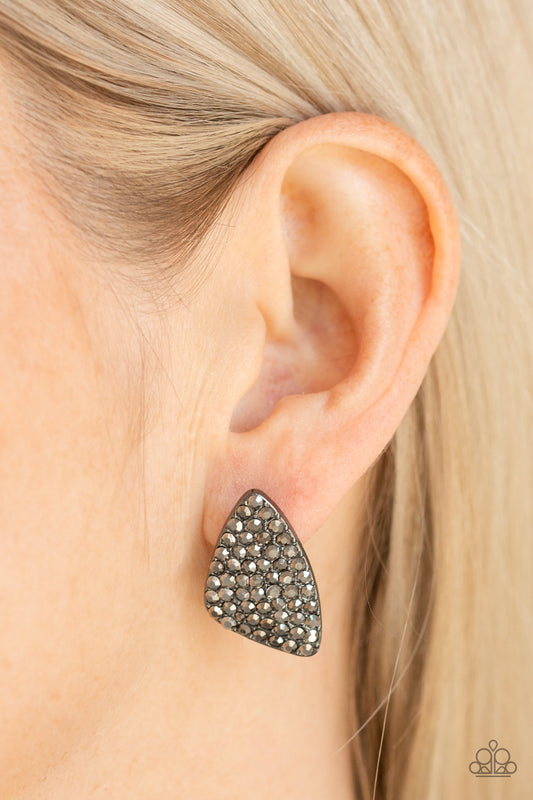 Supreme Sheen - Black Earrings the front of a triangular shaped frame is encrusted in row after row of glittery hematite rhinestones for a blinding look. Earring attaches to a standard post fitting.  Sold as one pair of post earrings.  Paparazzi Jewelry is lead and nickel free so it's perfect for sensitive skin too!