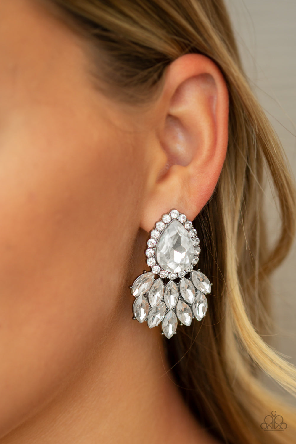 Paparazzi Accessories A Breath of Fresh Heir - White Earrings glassy white marquise style rhinestones cascade from the bottom of a dramatically oversized white teardrop gem, coalescing into a regal frame. Earring attaches to a standard post fitting.  Sold as one pair of post earrings.