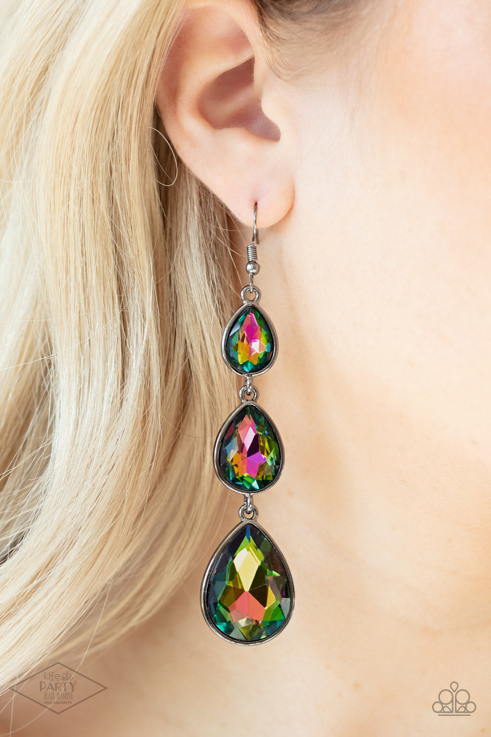 Metro Momentum - Multi Oil Spill Earrings featuring sleek gunmetal frames, exaggerated oil spill teardrop rhinestones gradually increase in size as they drip from the ear. Earring attaches to a standard fishhook fitting.  Sold as one pair of earrings.  Life of the Party Exclusive 