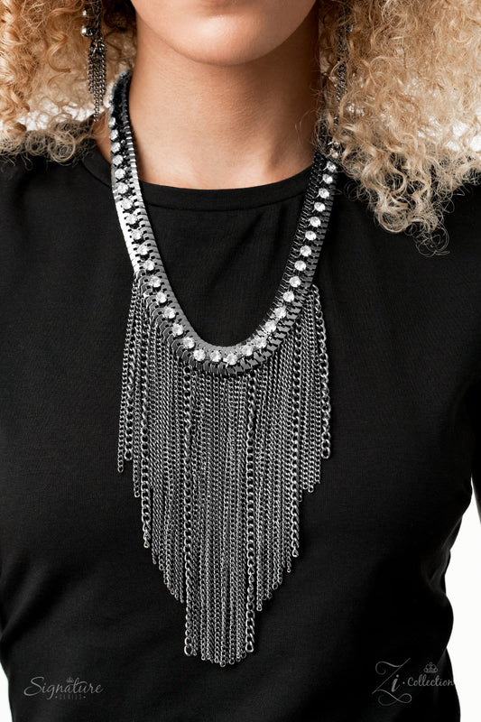 Paparazzi Accessories The Alex 2020 Zi Collection Necklaces a sassy curtain of mismatched gunmetal chains tapers from the bottom of a dramatic row of glassy white rhinestones that have been delicately fastened to an edgy row of flattened gunmetal chain. The exaggerated fringe cascades down the chest, resulting in a dauntless attitude that demands attention with every swish of the fearless fringe. Features an adjustable clasp closure.