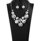 Paparazzi Accessories Unpredictable - 2020 Zi Collection Necklaces varying in size and shape, a dramatic collision of oversized white rhinestones connect into an unapologetically glamorous statement piece below the collar. Attached to chunky silver links, the breathtaking display of clustered gems radiates confidence. Features an adjustable clasp closure.  Sold as one individual necklace. Includes one pair of matching earrings.
