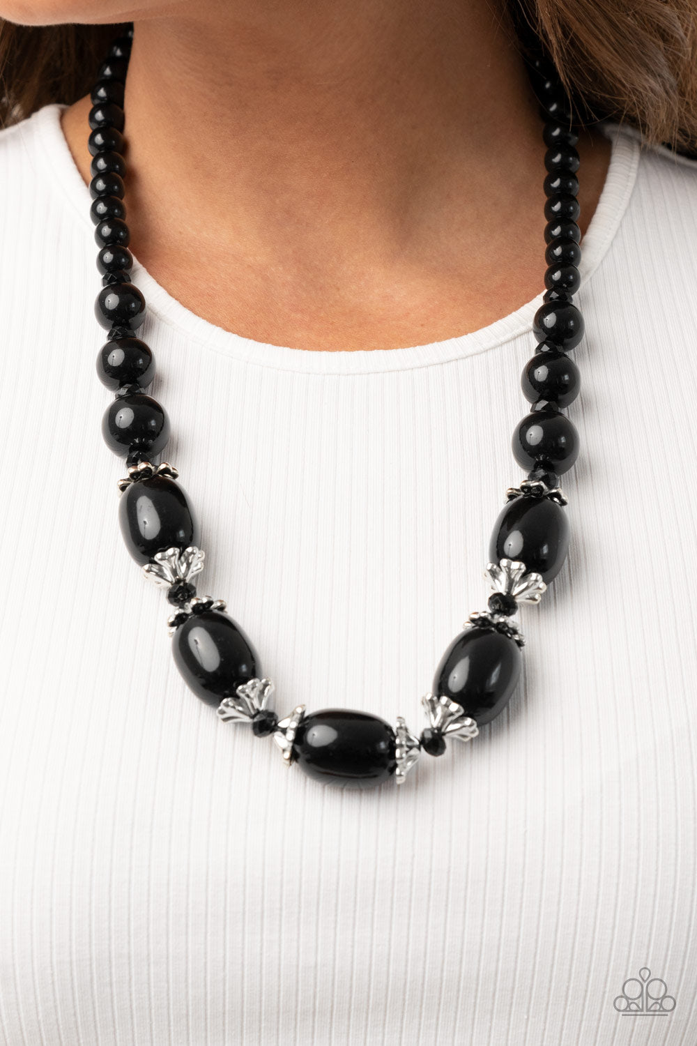 Paparazzi Accessories After Party Posh - Black Necklaces infused with decorative silver fittings and black crystal-like beads, oversized black beads boldly link below the collar for a glamorous pop of color. Features an adjustable clasp closure.  Sold as one individual necklace. Includes one pair of matching earrings.