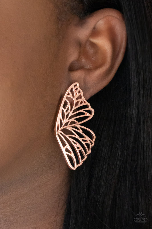 Butterfly Frills - Copper Earrings shiny copper bars delicately climb scalloped shiny copper frames, coalescing into a whimsical butterfly wing. Earring attaches to a standard post fitting.  Sold as one pair of post earrings.  Paparazzi Jewelry is lead and nickel free so it's perfect for sensitive skin too!