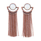 Paparazzi Accessories Opal Oracle - Copper Post Earrings a curtain of dainty copper chains stream from the bottom of a rustic crescent shaped copper frame that is dotted in a dewy opal bead for a mystical finish. Earring attaches to a standard post fitting.