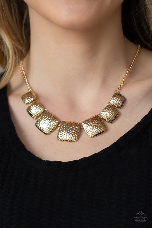 Paparazzi Accessories Keeping it Relic - Gold Necklaces gradually increasing in size near the center, a hammered collection of gold square frames delicately link below the collar for an artisan inspired look. Features an adjustable clasp closure.