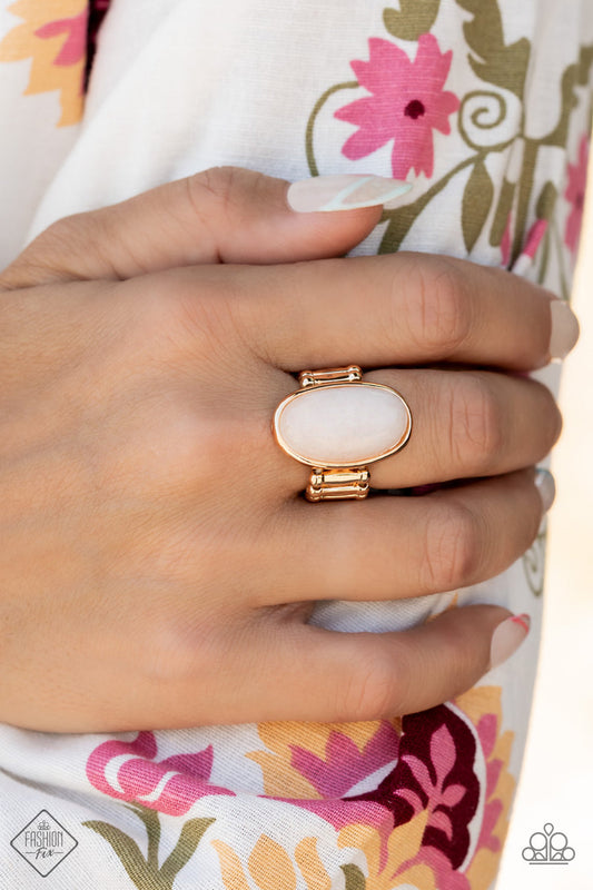 Paparazzi Accessories Mystical Mantra - Gold Rings a white oval stone is encased inside a sleek gold frame, creating a mystical centerpiece atop the finger. Features a stretchy band for a flexible fit.  Sold as one individual ring.