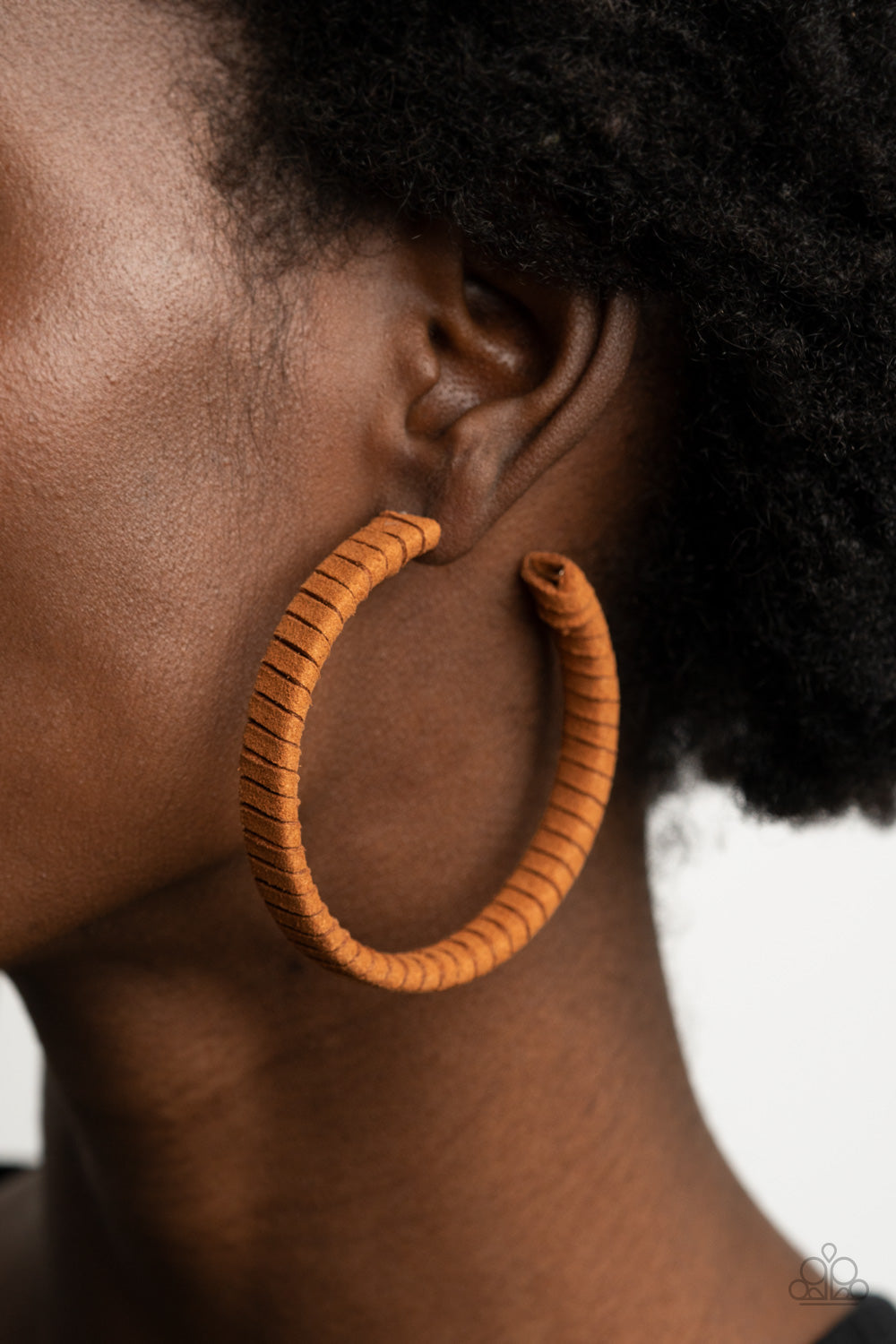 Paparazzi Accessories Suede Parade - Brown Hoop Earrings tan suede cording wraps around an oversized hoop, creating an earthy pop of color. Earring attaches to a standard post fitting. Hoop measures approximately 2 1/4" in diameter.