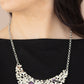 Fabulously Fragmented - Purple Rhinestone Necklaces - Paparazzi Accessories dporadically dotted in mismatched purple and white rhinestones, a smattering of fragmented silver frames coalesce into a bold half moon below the collar for an edgy fashion. Features an adjustable clasp closure.  Sold as one individual necklace. Includes one pair of matching earrings.