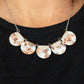 Mermaid Oasis - Orange Shell-Like Necklaces flecked in shell-like iridescence, orange acrylic discs are pinched between shiny silver fittings as they link below the collar, creating a colorful fringe. Features an adjustable clasp closure.  Sold as one individual necklace. Includes one pair of matching earrings.
