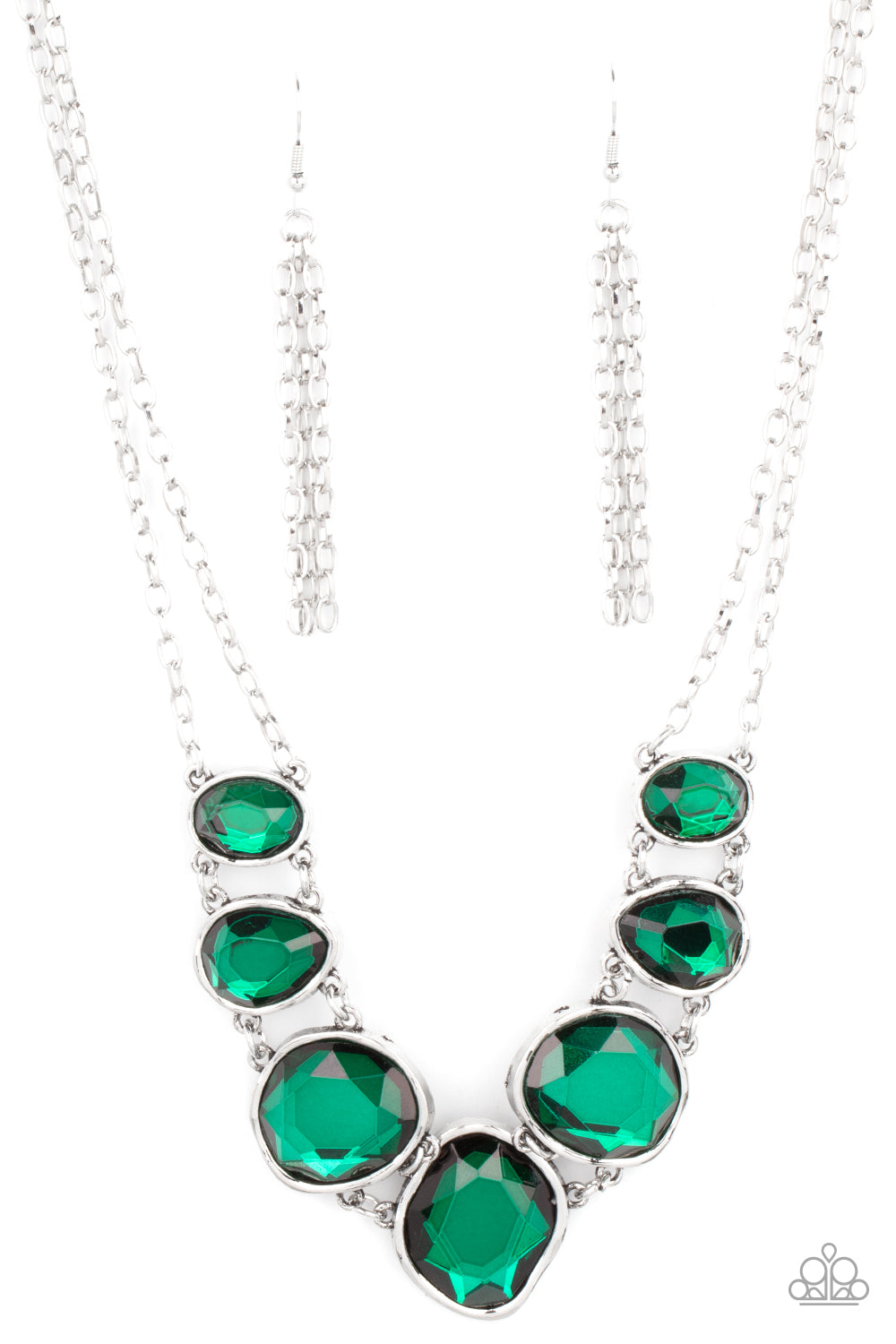 Absolute Admiration - Green Rhinestone Necklaces encased in hammered asymmetrical silver frames, an imperfect collection of faceted green gems are suspended from two shimmery silver chains as they double-link below the collar for a dramatic effect. Features an adjustable clasp closure.  Sold as one individual necklace. Includes one pair of matching earrings.