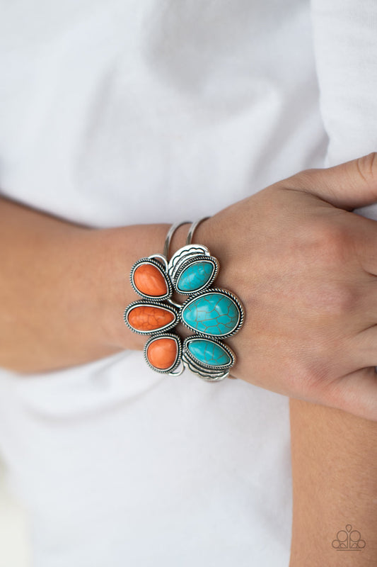 Botanical Badlands - Orange Hinged Bracelets encased in antiqued silver rope-like frames, a colorful collection of turquoise and orange stone teardrops stack into a rustic centerpiece atop a layered silver cuff. Features an adjustable hinged closure.  Sold as one individual bracelet.  Paparazzi Jewelry is lead and nickel free so it's perfect for sensitive skin too!