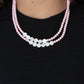 Paparazzi Accessories Extended STAYCATION - Pink Necklaces a summery collection of shiny white shell-like discs and dainty light-pink beads are threaded along invisible wires, creating colorful layers below the collar. Features an adjustable clasp closure.  Sold as one individual necklace. Includes one pair of matching earrings.  Paparazzi Jewelry is lead and nickel free so it's perfect for sensitive skin too!