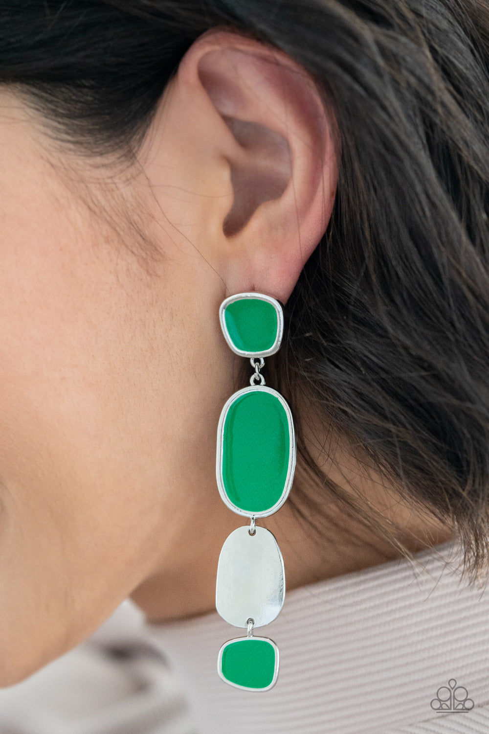 All Out Allure - Green Earrings painted in a shiny Mint finish, asymmetrical frames attach to a single silver frame, creating an abstract lure. Earring attaches to a standard post fitting.  Sold as one pair of post earrings.  Paparazzi Jewelry is lead and nickel free so it's perfect for sensitive skin too!