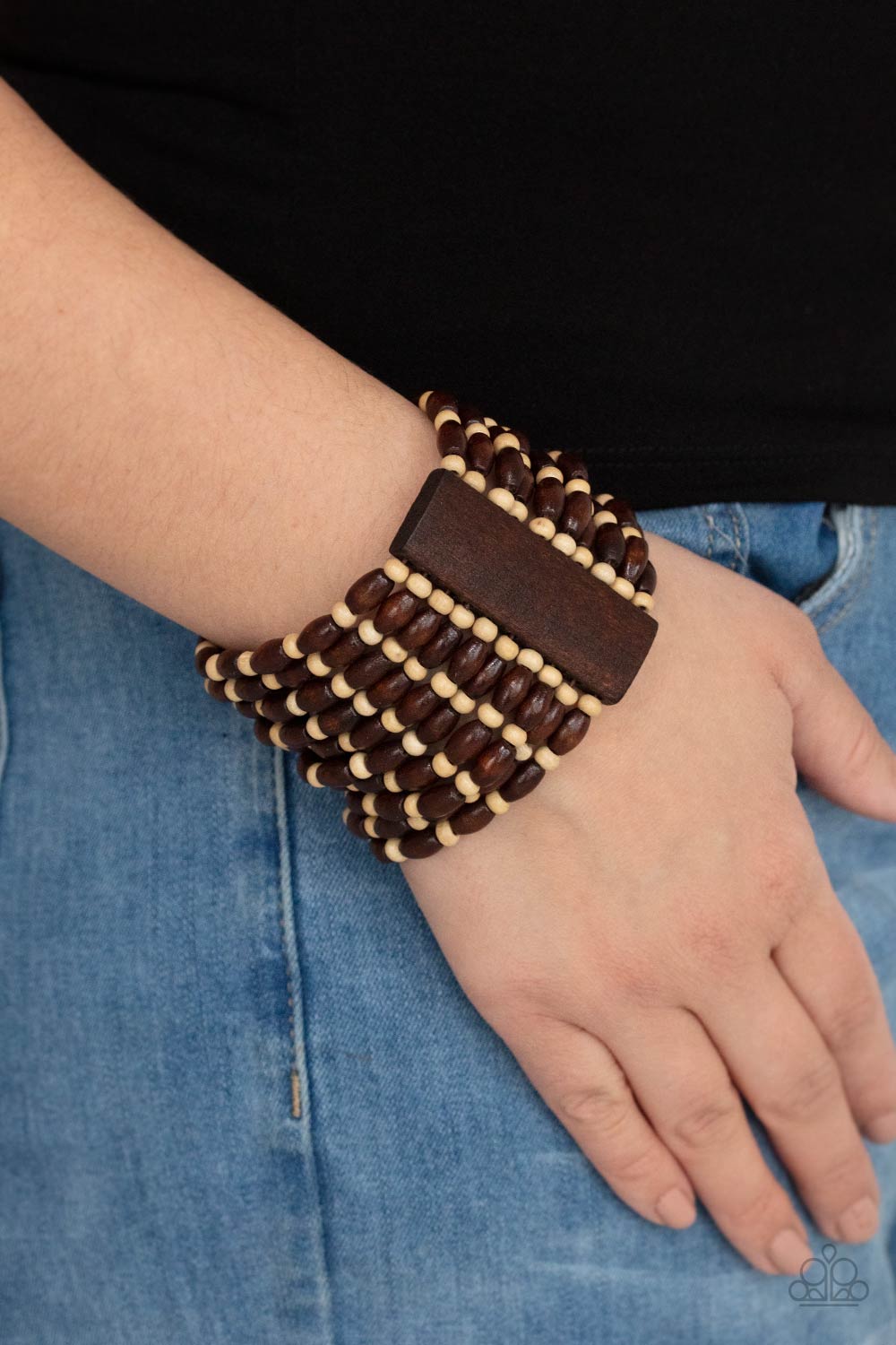 Cayman Carnival - Brown Wood Stretch Bracelets held together with rectangular wooden frames, an earthy collection of white wooden beads and brown oval wooden beads are threaded along stretchy bands around the wrist for a bold beach inspired fashion.  Sold as one individual bracelet.