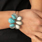Paparazzi Accessories Botanical Badlands - White Bracelets encased in rope-like silver accents, a series of oversized oval and teardrop turquoise and white stone frames stack into a lotus-like floral frame atop a layered silver cuff. Features a hinged closure.  Sold as one individual bracelet.  Paparazzi Jewelry is lead and nickel free so it's perfect for sensitive skin too!