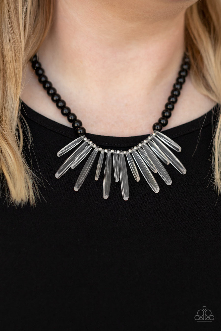 Icy Intimidation - Black Beaded Necklaces acrylic icicles drip from the center of a strand of black beads, creating an intensely icy fringe below the collar. Features an adjustable clasp closure.  Sold as one individual necklace. Includes one pair of matching earrings.