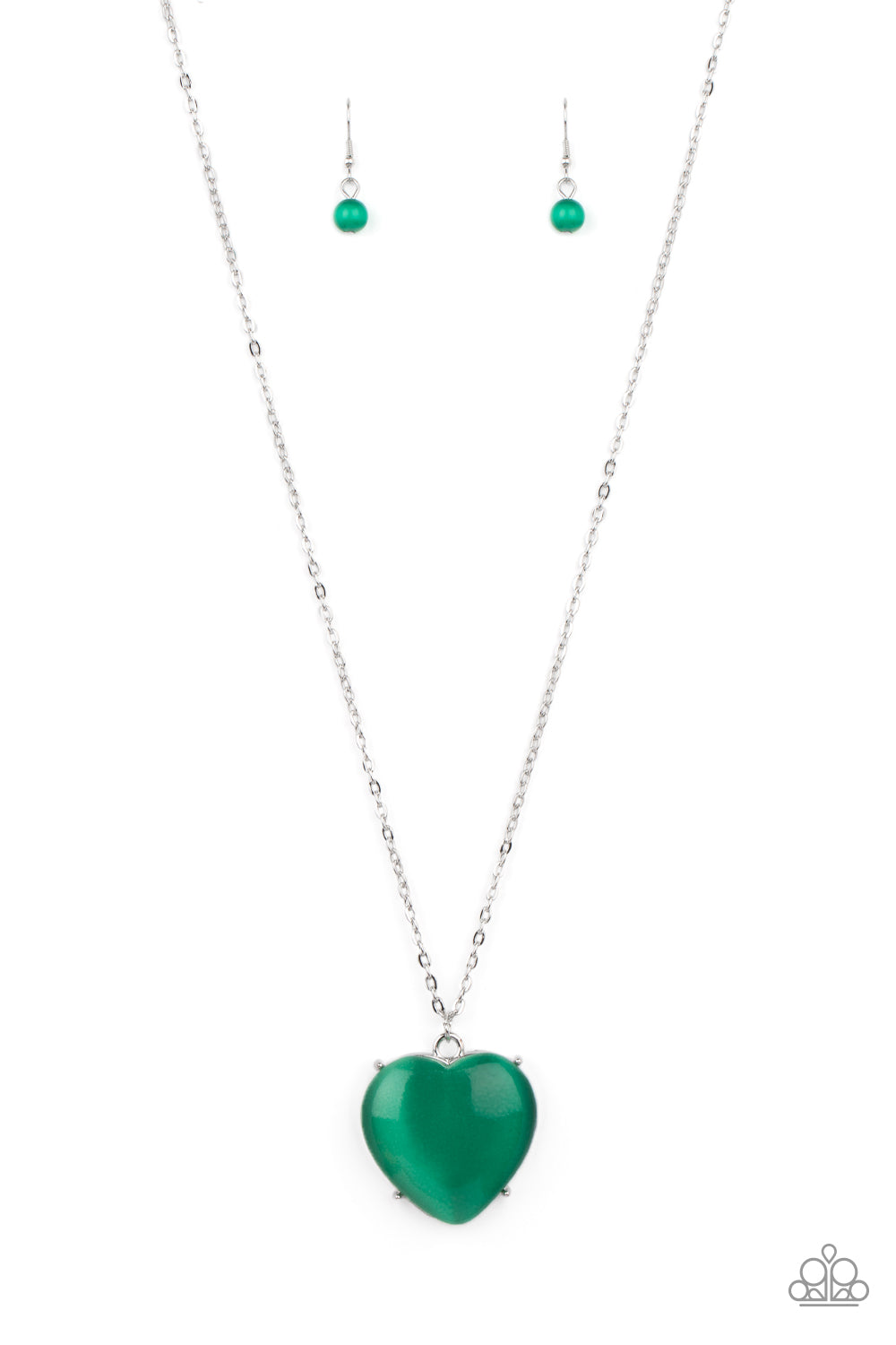 Warmhearted Glow - Green Necklaces oversized Mint cat's eye stone frame swings from the bottom of a lengthened silver chain, creating a flirtatious pendant. Features an adjustable clasp closure.  Sold as one individual necklace. Includes one pair of matching earrings.  Paparazzi Jewelry is lead and nickel free so it's perfect for sensitive skin too!