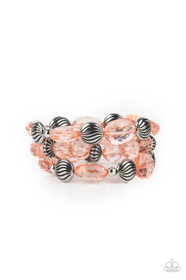 Crystal Charisma - Orange Stretch Bracelet a mismatched collection of sparkly Burnt Coral crystal-like beads and textured silver accents are threaded along stretchy bands around the wrist, creating glamorous layers.  Silver accent and pink clear bead strands stack together in three to make this feminine piece.