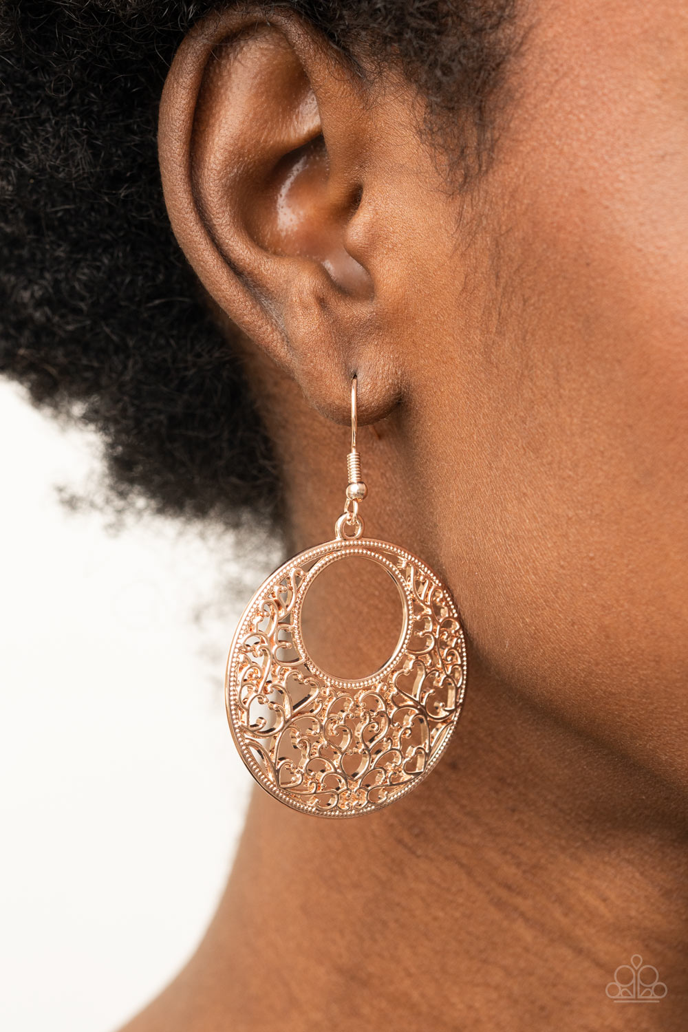 Vineyard Romance - Rose Gold Filigree Earrings shimmery vine-like rose gold filigree climbs the inside of a studded circular frame, creating a whimsical centerpiece. Earring attaches to a standard fishhook fitting.  Sold as one pair of earrings.