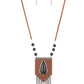 Enchantingly Tribal - Black Leather Necklaces - Paparazzi Accessories bold black teardrop stone encased in an antiqued silver frame is centered on a brown leather insignia-like pendant. Decorated with a silver plate embossed in geometric designs and a tinkling fringe of embossed silver plates suspended from the bottom, the pendant sways from lengthened leather cords accented with black stone beads for an enchantingly timeless finish. Features an adjustable clasp closure.  Sold as one individual necklace.
