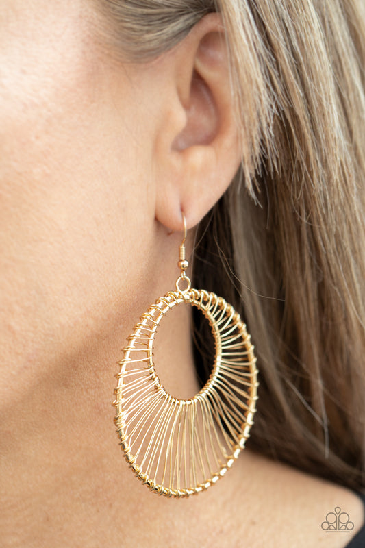 Paparazzi Accessories Artisan Applique - Gold Earrings glistening gold wire wraps around two gold hoops, creating an airy crescent shaped frame for an artisan inspired fashion. Earring attaches to a standard fishhook fitting.  Sold as one pair of earrings.