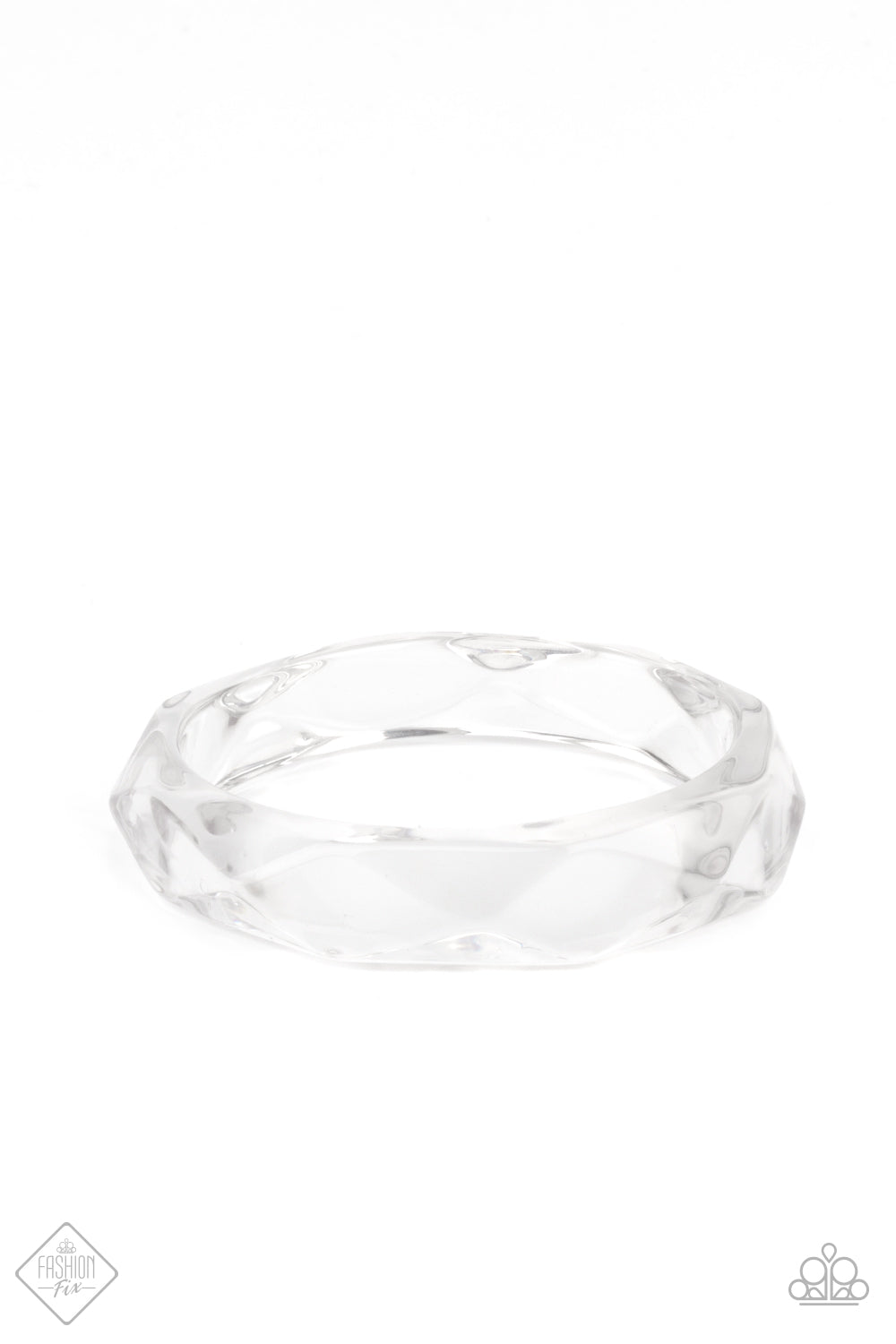 Paparazzi Accessories Clear-Cut Couture - White Bangle Bracelets featuring a flashy faceted surface, an oversized crystal-like acrylic bangle glides along the wrist, casting rainbow reflections with its glassy exterior.