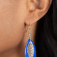 Venetian Vanity - Blue Fishhook Earrings a symmetrically bordered in a bright Mykonos Blue frame, airy silver filigree blooms along the center of a colorful lure for a seasonal flair. Earring attaches to a standard fishhook fitting.  Sold as one pair of earrings.  Paparazzi Jewelry is lead and nickel free so it's perfect for sensitive skin too!