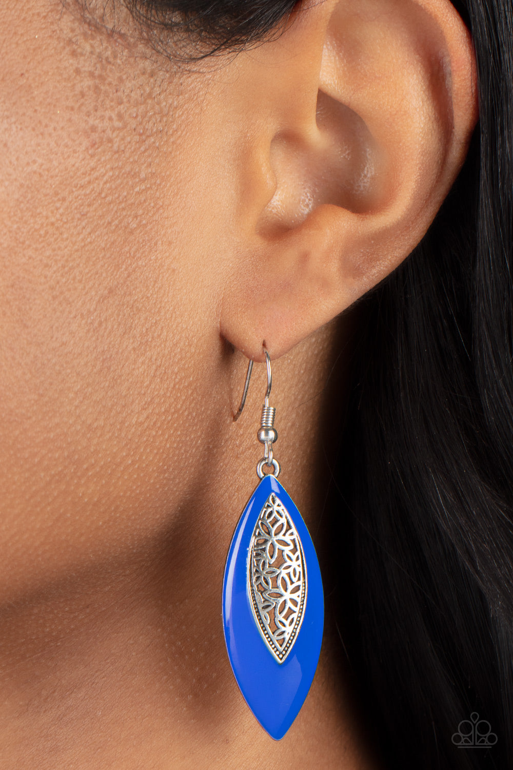 Venetian Vanity - Blue Fishhook Earrings a symmetrically bordered in a bright Mykonos Blue frame, airy silver filigree blooms along the center of a colorful lure for a seasonal flair. Earring attaches to a standard fishhook fitting.  Sold as one pair of earrings.  Paparazzi Jewelry is lead and nickel free so it's perfect for sensitive skin too!