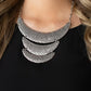 Moonwalk Magic - Silver Necklaces hammered in an antiqued silver dimpled texture, a trio of crescent shaped plates in graduating sizes stack one above the other and connect to a silver chain for a boldly modern fashion below the collar. Features an adjustable clasp closure.  Sold as one individual necklace. Includes one pair of matching earrings.  Paparazzi Jewelry is lead and nickel free so it's perfect for sensitive skin too!