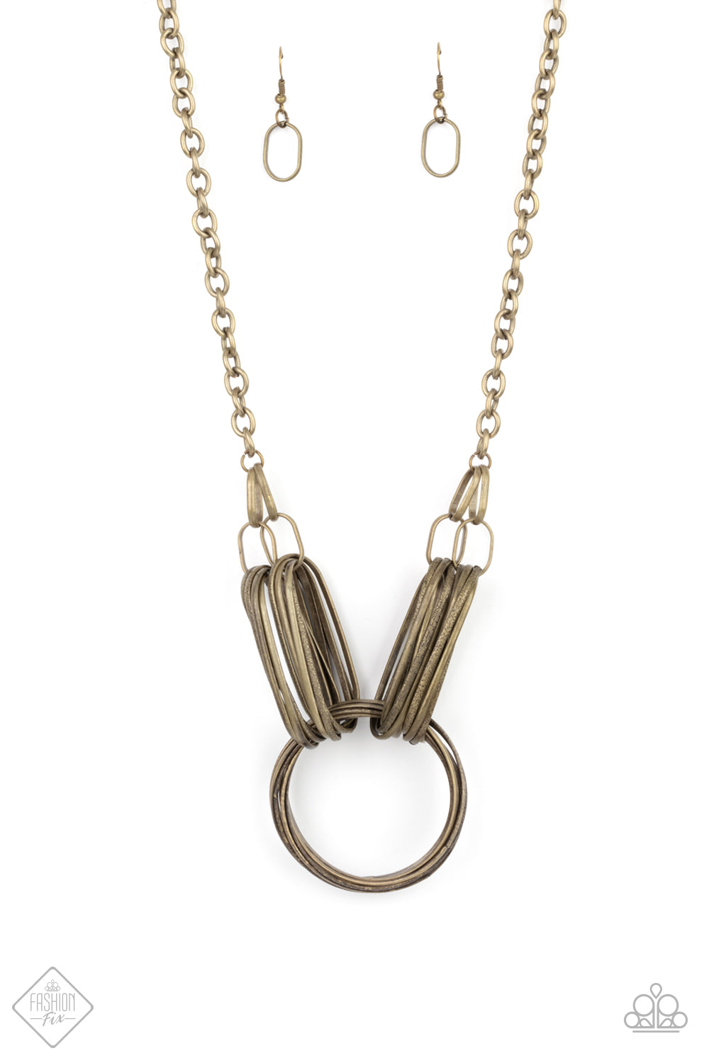 Paparazzi Accessories Lip Sync Links - Brass Necklaces and Bracelets Set layers of oblong brass links attach to a collection of oversized antiqued brass rings creating a dramatic industrial centerpiece. Attached to a brass chain, the rustic links create an unconventionally edgy statement below the collar. Features an adjustable clasp closure.  Sold as one individual necklace and Bracelets. Includes one pair of matching earrings.